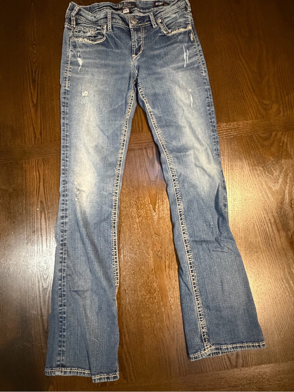 Silver Suki Mid Rise Boot Cut Jeans